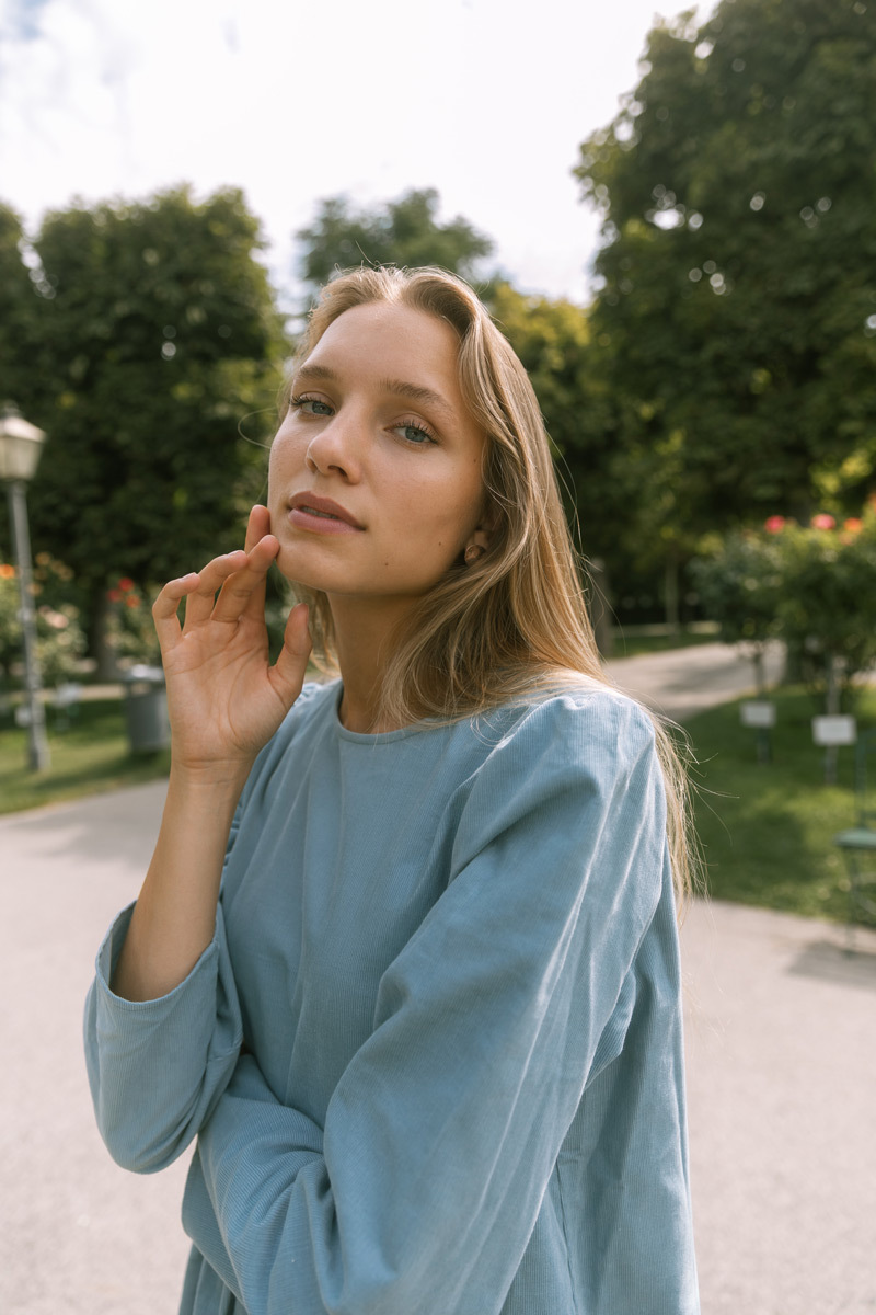 Blonde girl in a blue dress