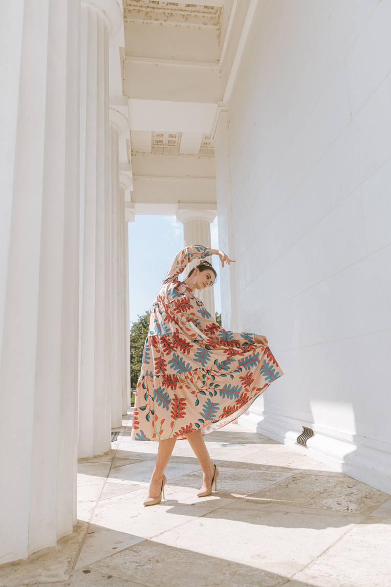 Girl in a dress, dancing in the Theseustemple in Vienna