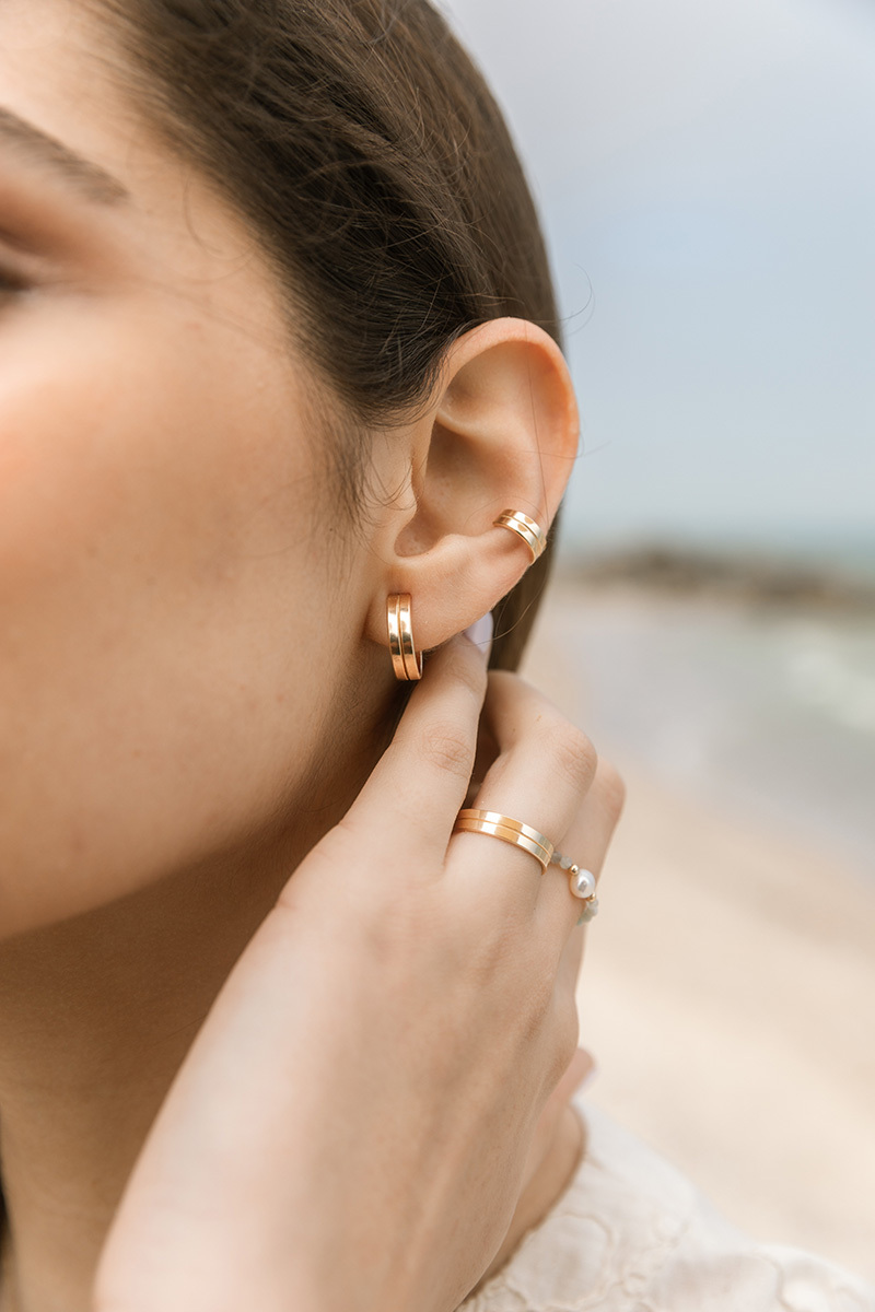 close up earrings and rings