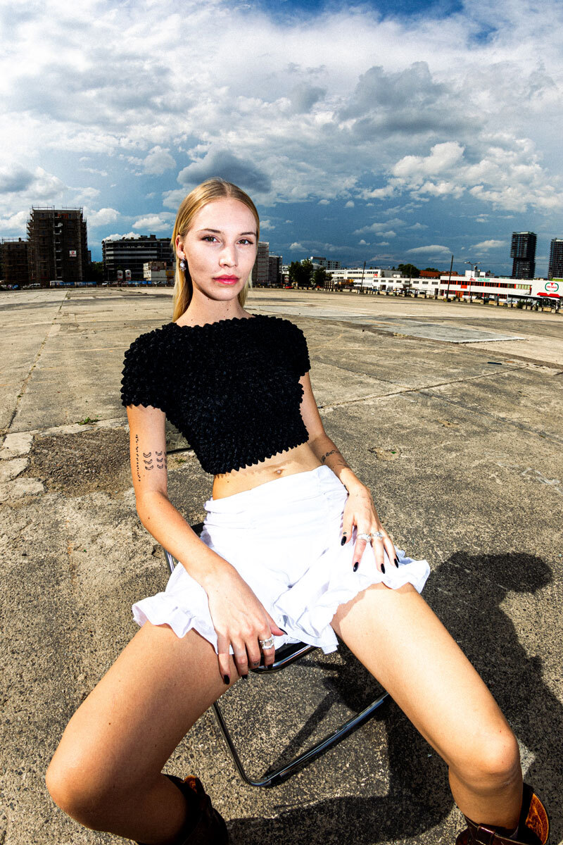 girl sitting on chair