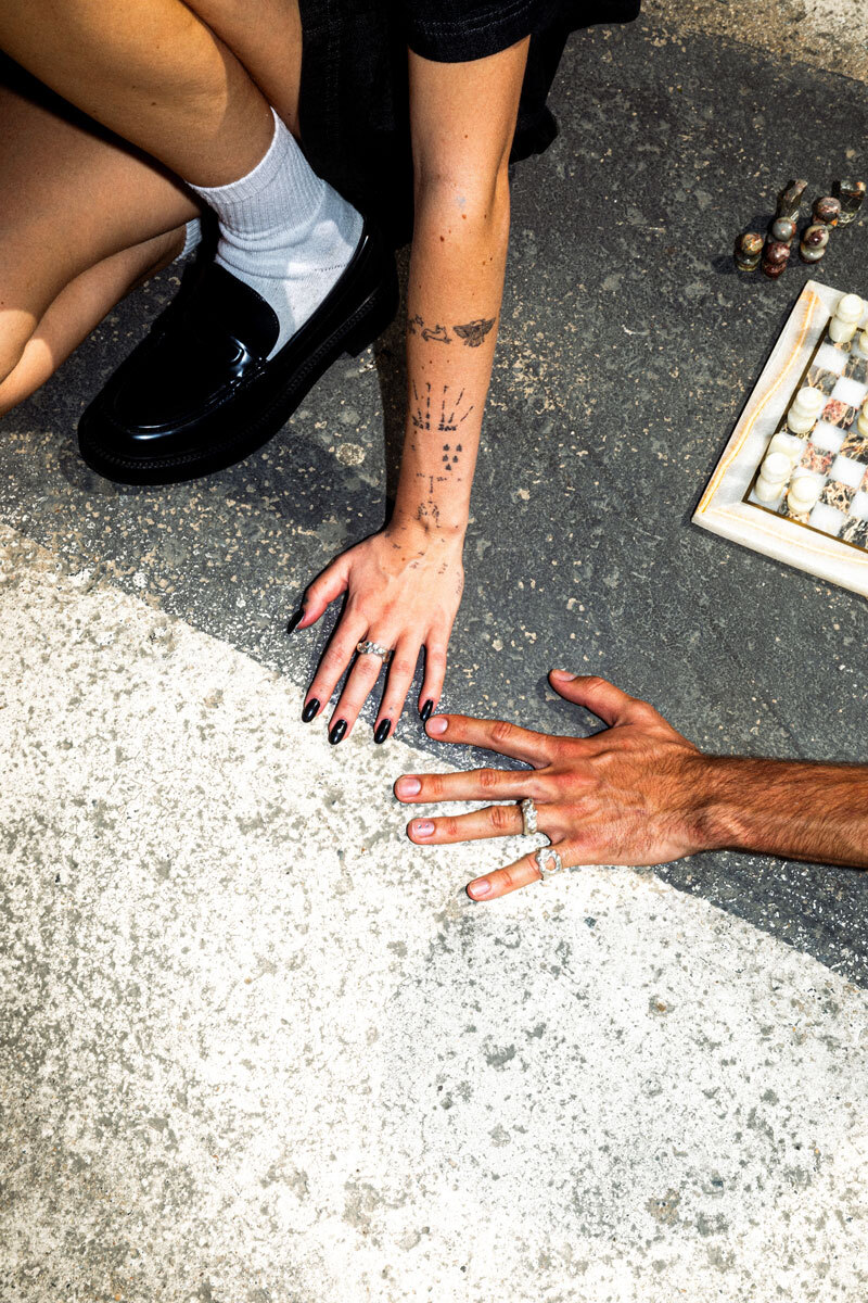 focus on hands of boy & girl